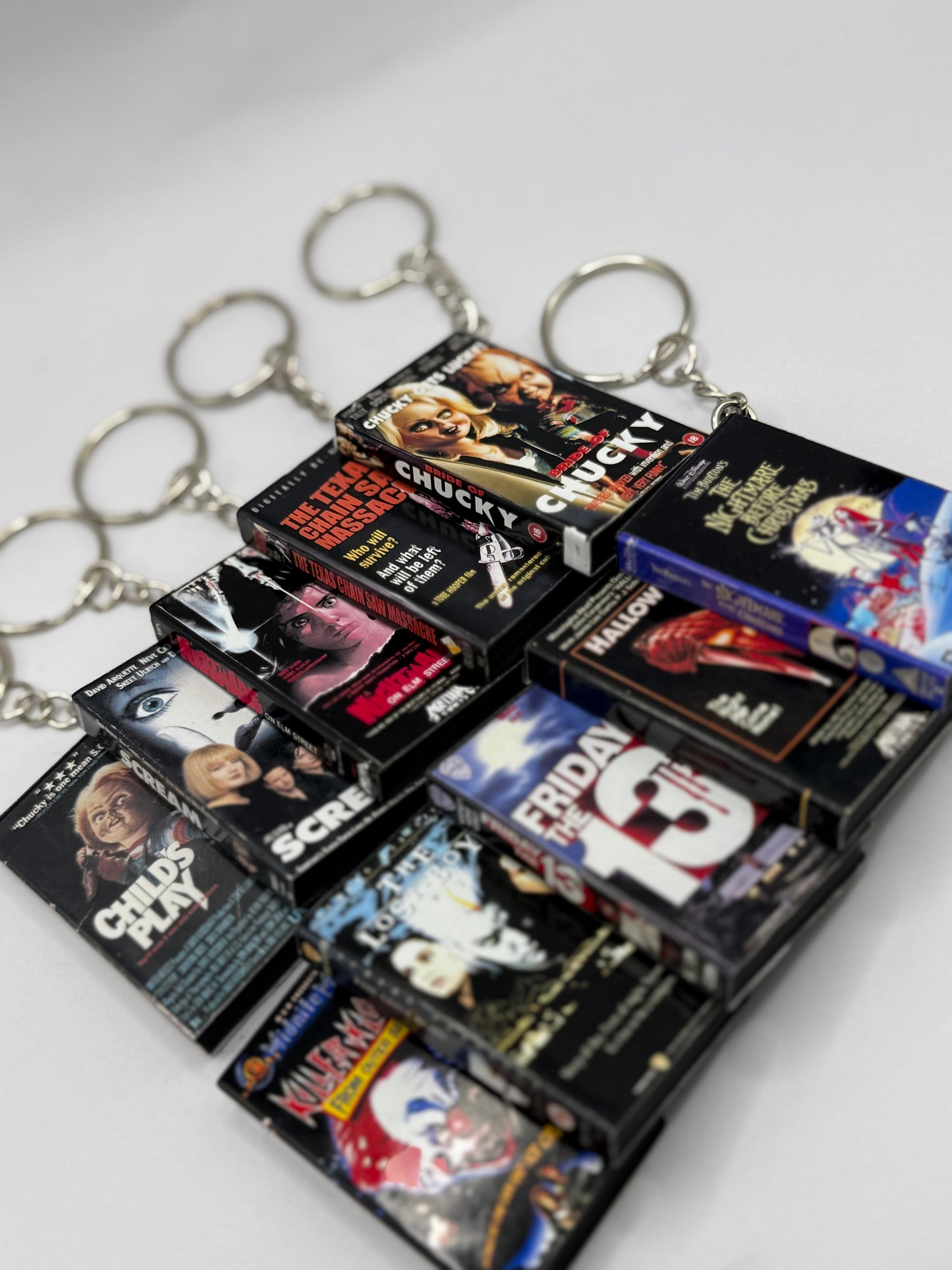 Horror Hits Stand + All 10 VHS Keychains