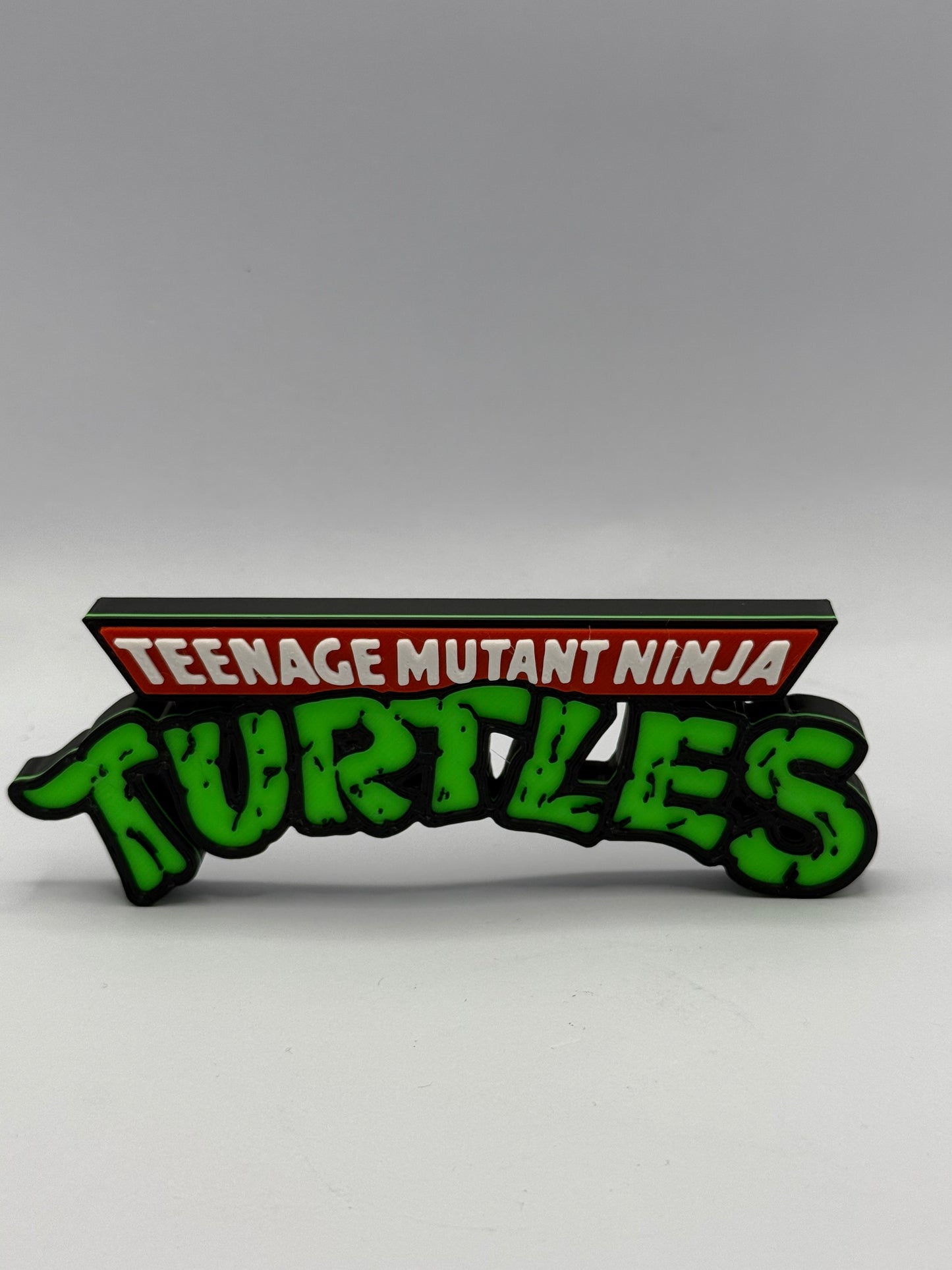 Teenage Mutant Ninja Turtles Freestanding Display Plaque, 3D Printed Logo